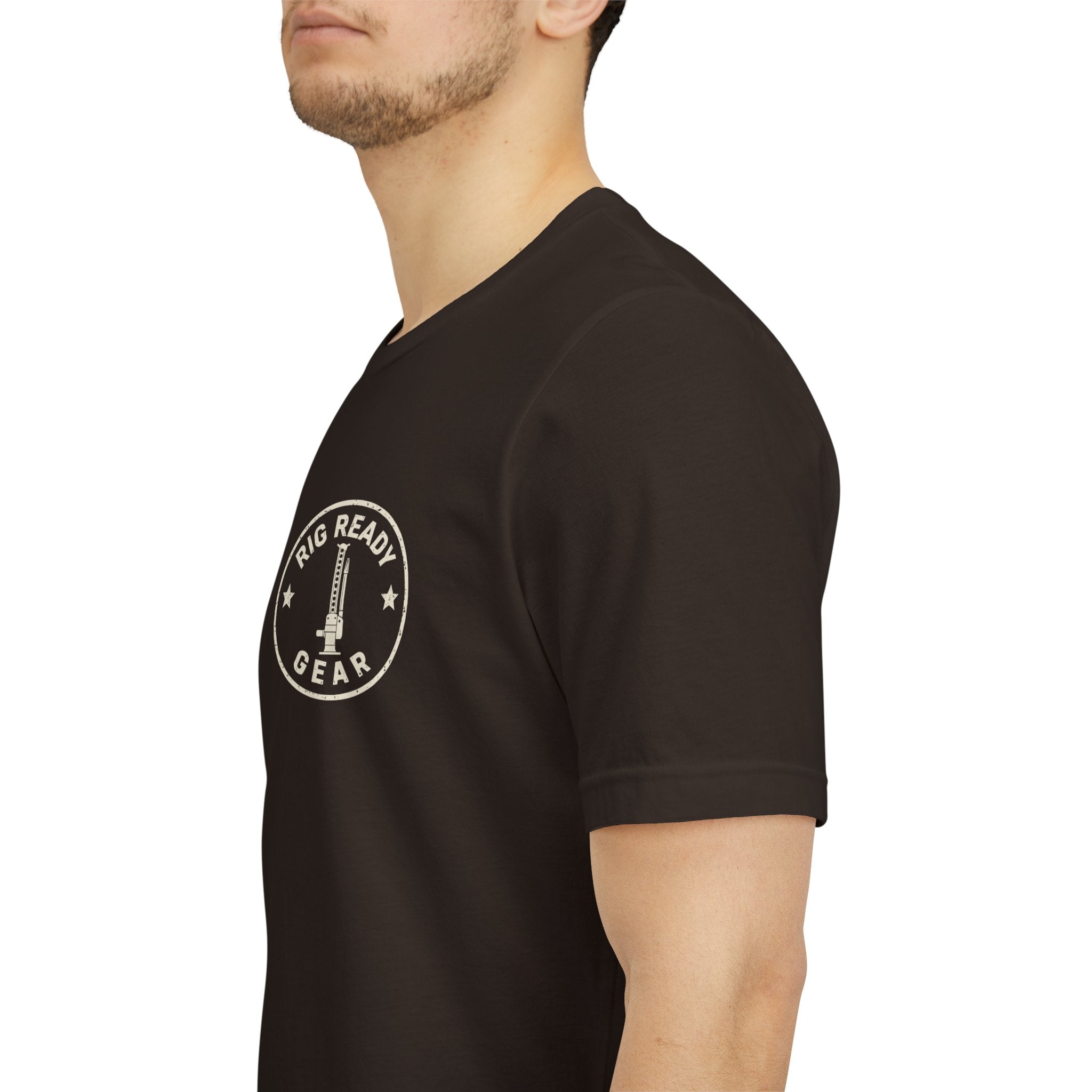 Black t-shirt with colorful text worn by a person on a white background