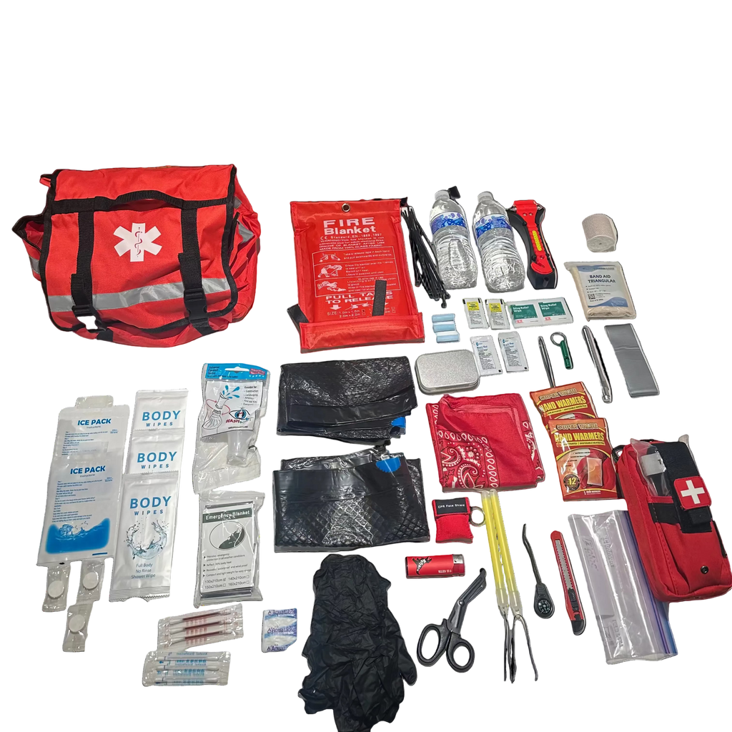 First aid kit and emergency supplies on a table with chairs and a patterned rug in the background.