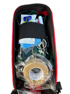 Individual  FAK personal trauma kit open shot in red color