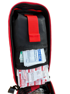 Individual  FAK personal trauma kit open shot in red color