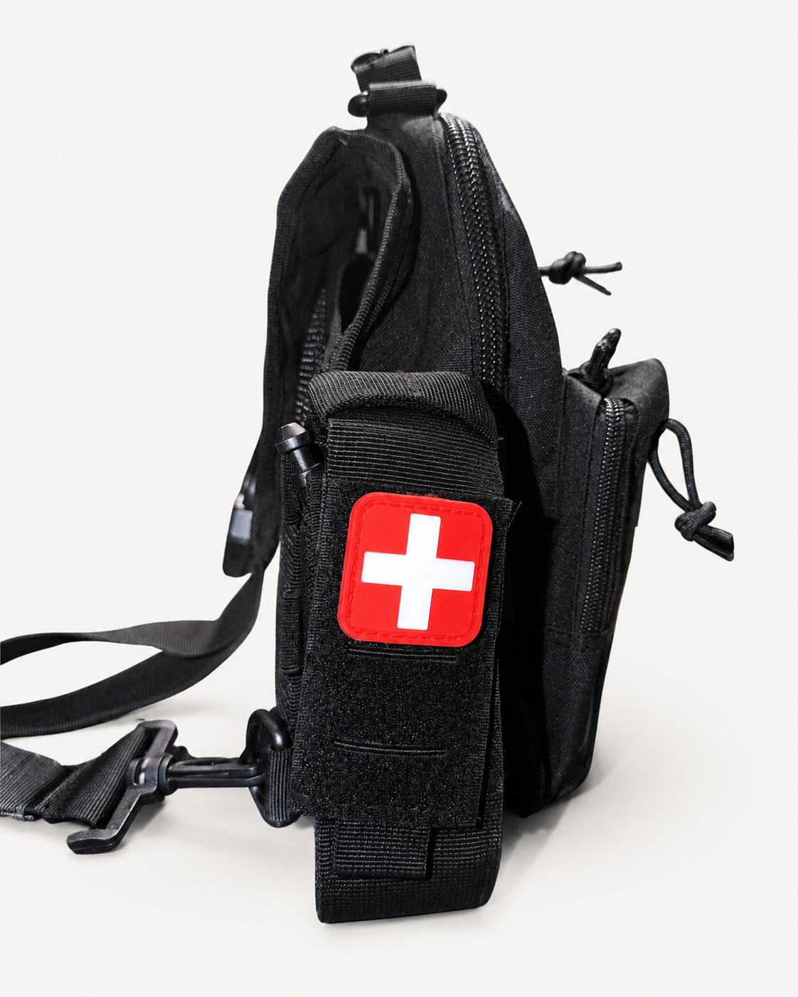 Level 1 Get Home Sling Bag black side detail with external medical pouch