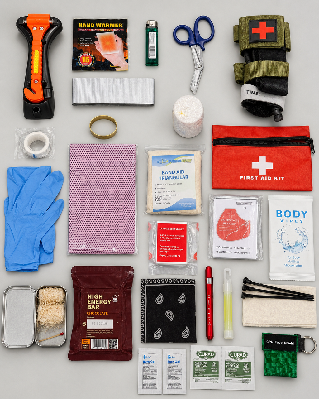 Level 1 Get Home Sling Bag contents flat lay showing medical, food, fire, light, signaling, utility, and comfort supplies
