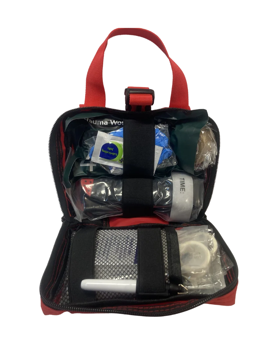 Open Vehicle Trauma Kit Personal IFAK showing packed trauma supplies